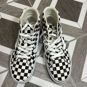 Checkered Vans high tops